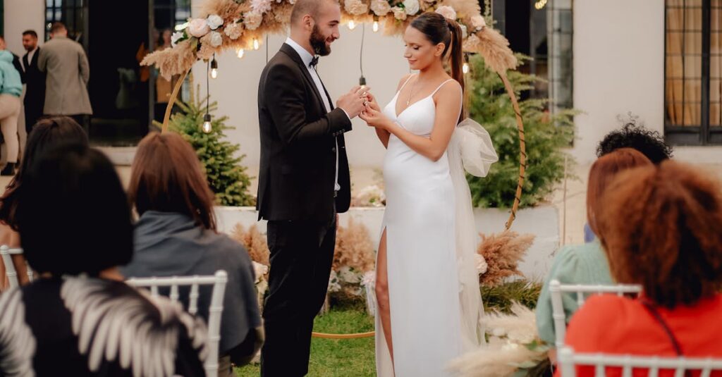 Bride and groom exchange vows in a picturesque outdoor setting. Perfect moment captured.