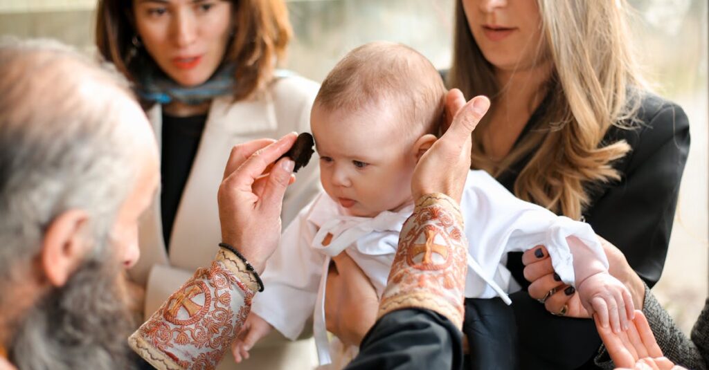 A touching moment during a baby's baptism, showcasing family and religious traditions.