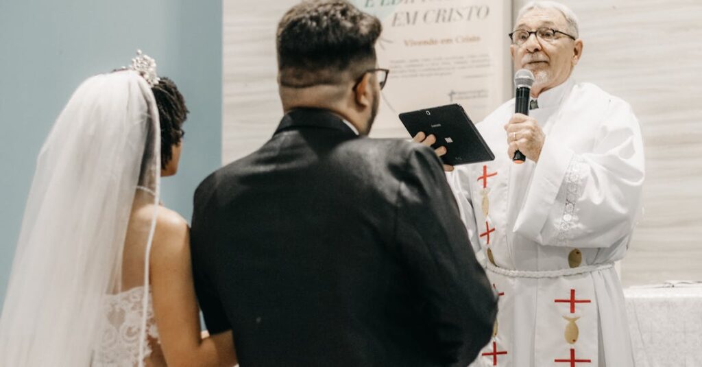 A priest officiates a wedding ceremony, speaking to the newlywed couple in a church setting.