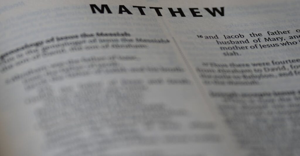 pexels-photo-20802847-20802847 Close-up of an open Bible showing the Book of Matthew with selective focus.