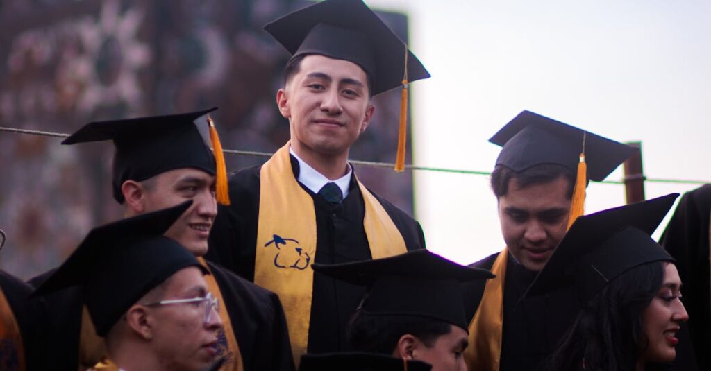 Group of graduates in caps and gowns celebrating their achievement outdoors.