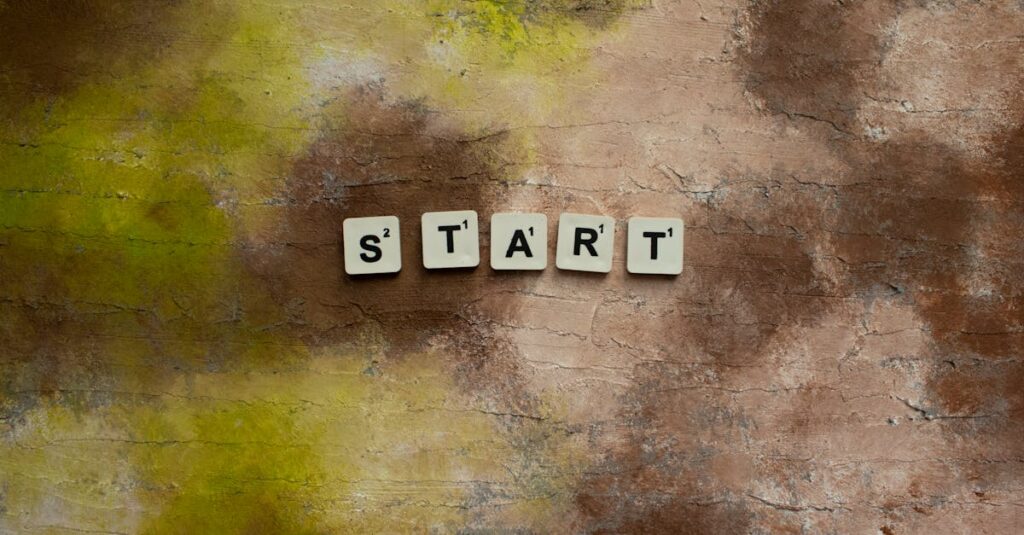 Scrabble letters spelling "START" on a textured earthy background.