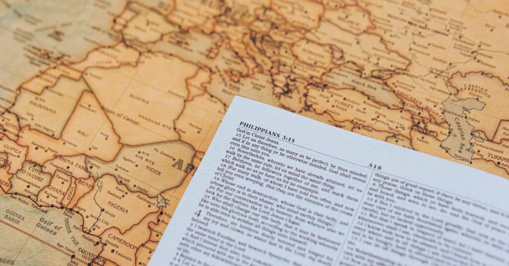A vintage map featuring a page from the Bible with Philippians 3:15.