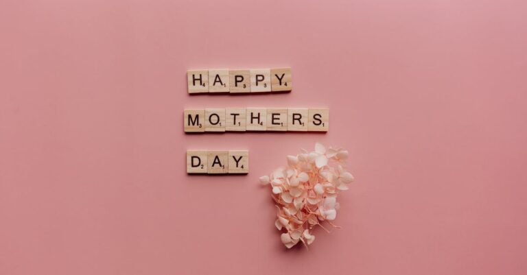 Celebrate Mother's Day with a heartfelt message and pink flowers on a serene pink background.
