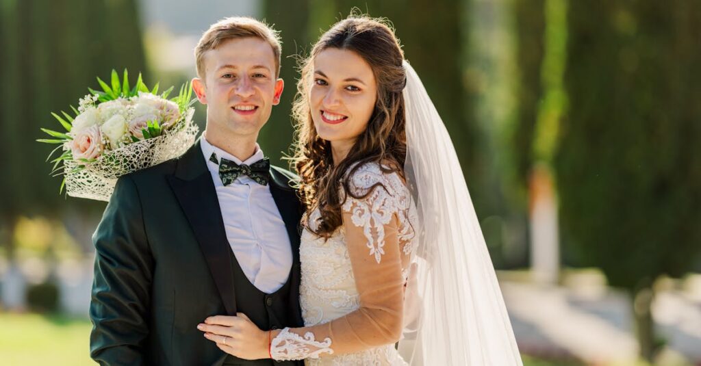 Bride and groom posing with smiles in outdoor wedding setting, Bușteni.