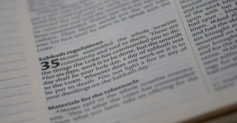 Detailed close-up of a Bible page focusing on Sabbath regulations text.